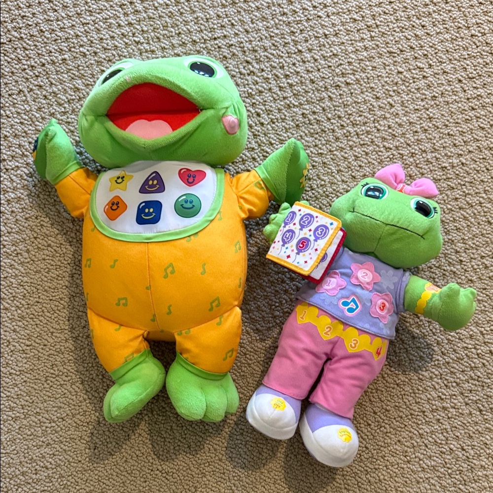 Plush Green Frog Musical Toy with Orange Outfit and Smaller Green Friend